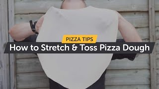 How to Stretch and Toss Pizza Dough  Making Pizza at Home [upl. by Ynatsyd]