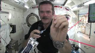 Chris Hadfield demonstrates how astronauts wash their hands in zerog [upl. by Mommy]