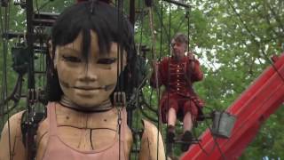 Giant marionettes take over Montreal [upl. by Seuqirdor501]