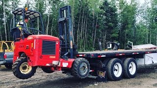 LOADING MOFFETT PIGGYBACK ON FLATBED TRAILER [upl. by Kissee]