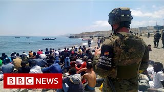 Migrants reach Spains Ceuta enclave in record numbers – BBC News [upl. by Otes]