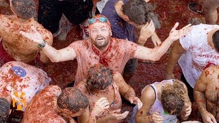 La Tomatina  Festival Discoveries  World Nomads [upl. by Pool]