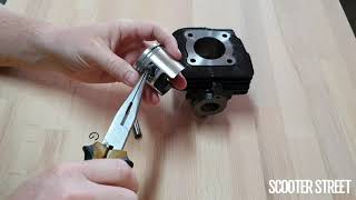 Scooter Piston Assembly  How To Install Rings [upl. by Eyllek]