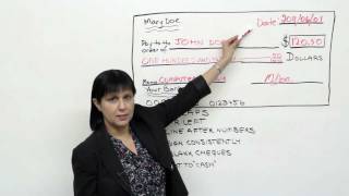 Practical English How to write a check [upl. by Eusadnilem]