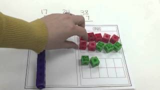 Addition with Regrouping using Manipulatives [upl. by Surbeck327]