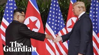 Moment Kim Jongun and Donald Trump share historic handshake [upl. by Switzer]