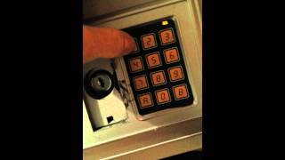 How to reset code on an electronic safe [upl. by Aihsoek]