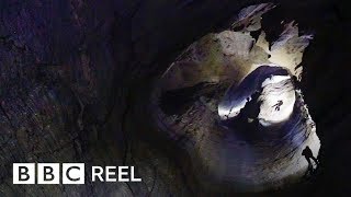 The daring journey inside the worlds deepest cave  BBC REEL [upl. by Egap]