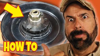 HOW TO REPLACE MOWER SPINDLE  PULLEY [upl. by Eidnew937]