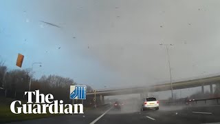 Tornado captured on dashcam as it crosses M25 in Surrey [upl. by Nosdivad271]