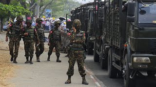 Myanmar Armoured vehicles seen in Yangon as Aung San Suu Kyis detention extended [upl. by Ykcub]