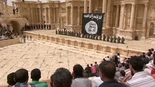 ISIL video shows mass killings in Syrias Palmyra [upl. by Buckden930]