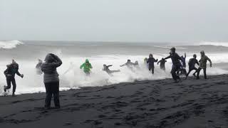 Waves Sneak Up Reynisfjara Beach in Iceland and Knock Over Tourists [upl. by Siron584]