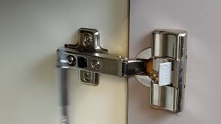 How To Adjust Your Kitchen Door Hinges [upl. by Sirovart]