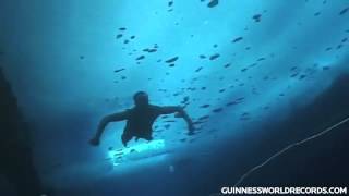 Farthest swim under ice Guinness World Records [upl. by Akinorev]