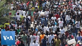 Thousands Rally in Haiti Against President Moise [upl. by Oicnerual698]